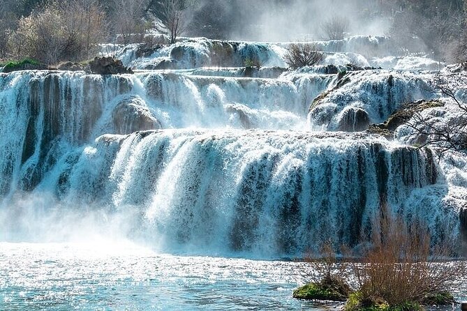 Airport Zadar or Zadar to Split via Krka waterfalls for singles or couples - Primošten and the Plaza Velika Raduča Swim Stop