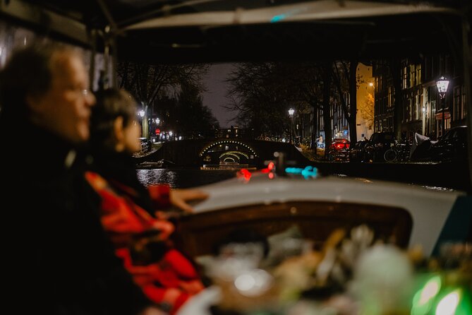 Amsterdam: Private Romantic Evening Canal Cruise + Bubbles/Snacks - Winter warmth and summer openness