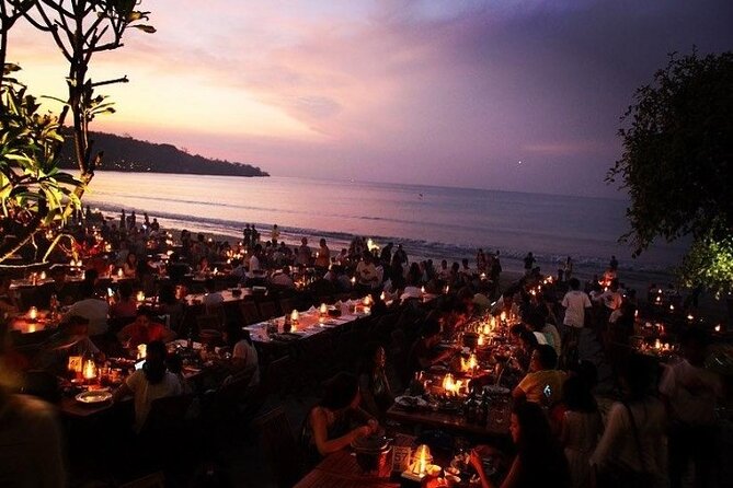 Bali Romantic Seafood Dinner under sunset jimbaran Beach - Sunset views, city lights, and the crowded beach