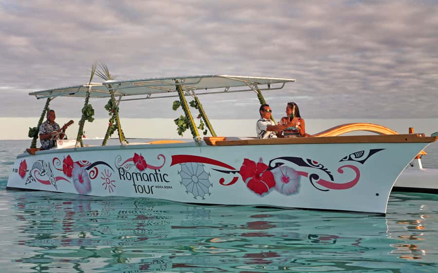 Bora Bora: Combo Sunset Cruise & Romantic Dinner at St James - Setting out on the Polynesian outrigger canoe