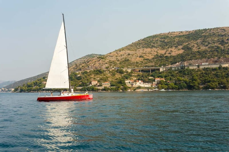 Dubrovnik: Romantic Sunset Sailing Adventure - Leaving the curved Bay of Lapad
