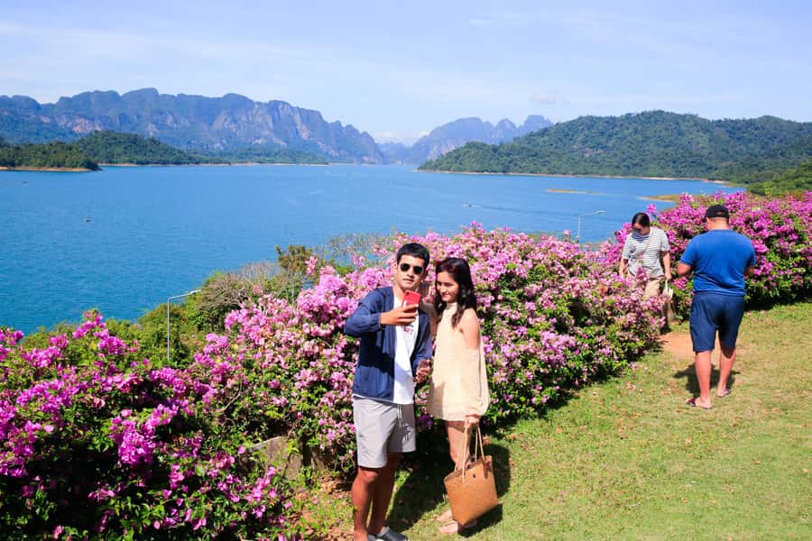 Khao Lak: Cheow Lan Lake Romantic Sunset Cruise with Drinks - Raft houses, kayaking, and another view of the water