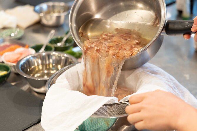 Kyoto: Enjoy Sushi & Market Tour! Best for Family & Couple! - Nishiki Market: fish cutting before the cooking begins