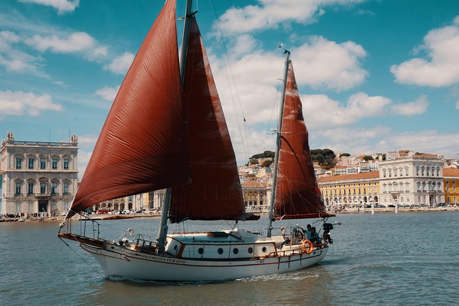 Marriage proposal on a Vintage Sailboat - Cristo Rei and the southern bank