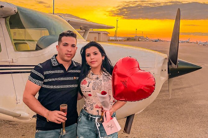Miami Beach: Romantic Sunset Private Airplane Tour with Champagne - Seaquarium and seaport views