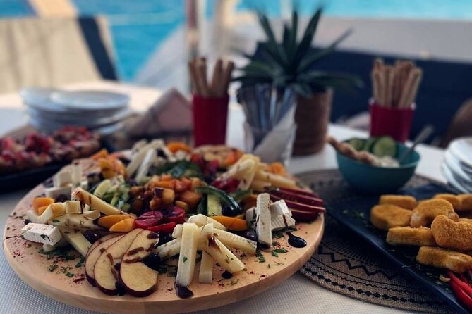 Panormo: Luxury Sunset Catamaran Cruise Sushi & Open Bar - Starting at Panormo Port with a relaxed welcome