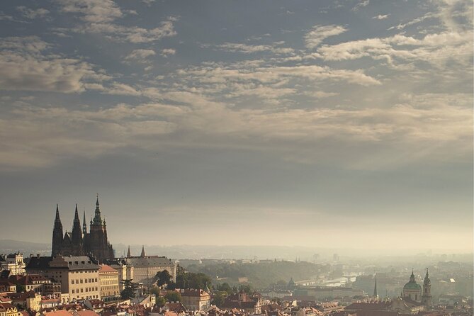 Prague Photoshoot for Couples, Betrothed, Family & Friends - Crossing Charles Bridge with a camera