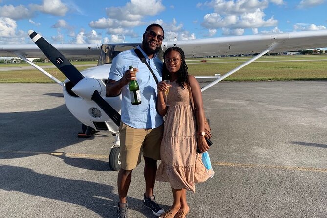 Private 60 Minute Romantic Excursion Air Tour with Champagne - Fisher Island and Key Biscayne from the aircraft