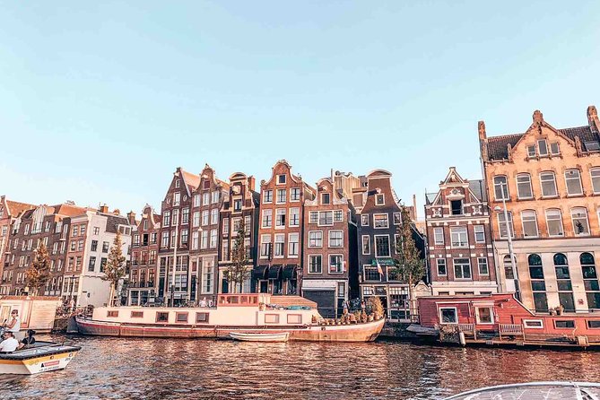 Private Romantic Canal Cruise Amsterdam with Bubbly and Snacks - Houseboats, the Skinny Bridge, and romantic stories