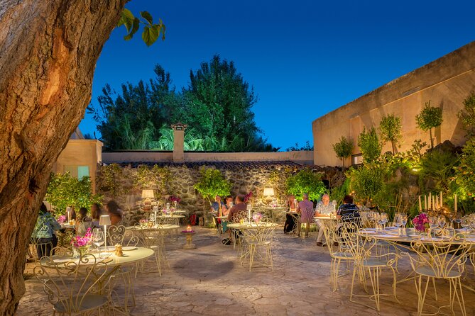 Romantic Dinner from Taormina with Vintage Car Tour - Restaurant seating or a private dinner area
