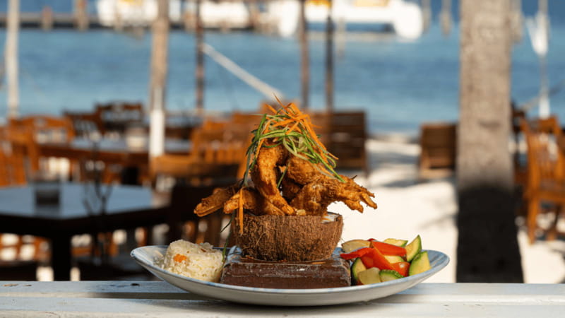 Romantic dinner in front of the sea - A private table with the sand at your feet