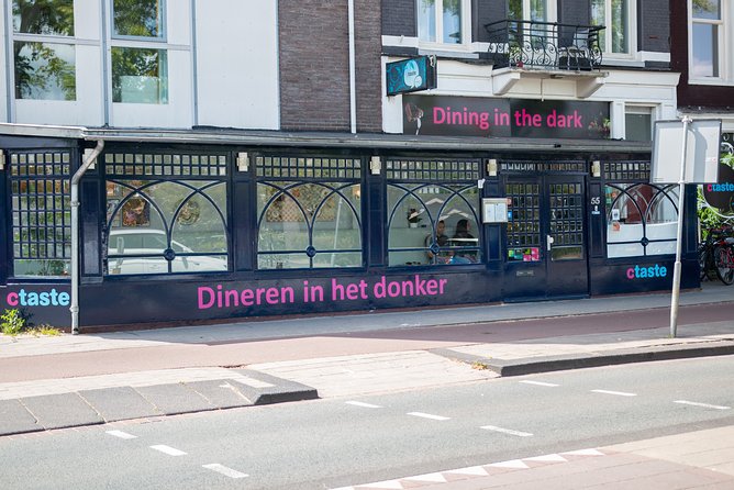 Romantic Dinner in the Dark Amsterdam - The Role of the Servers