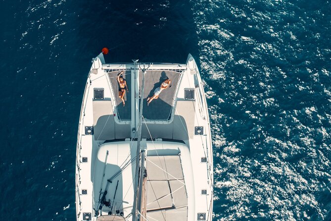 Romantic Sunset Catamaran Caldera Cruise incl. Meal & Drinks - White Beach, Mesa Pigadia, and lunch on deck
