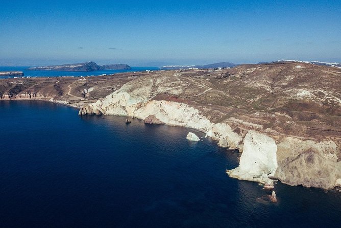 Romantic Sunset Catamaran Caldera Cruise incl. Meal & Drinks - Sunset toward Oia and Ammoudi Bay