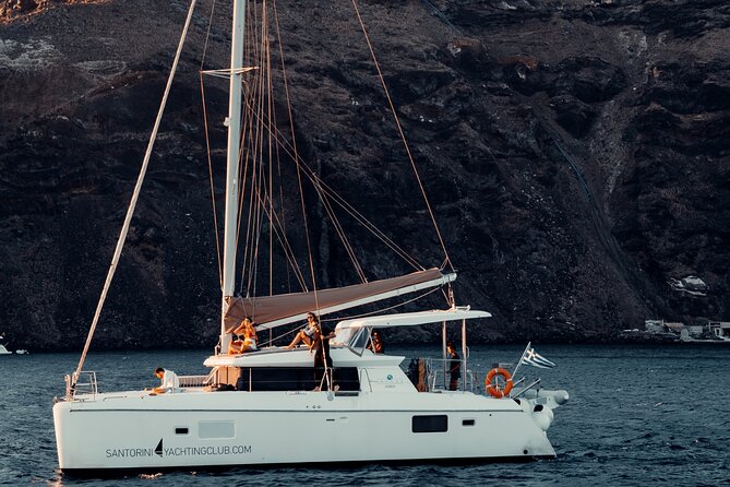 Romantic Sunset Catamaran Caldera Cruise incl. Meal & Drinks - Pickup, boarding, and the long Santorini afternoon