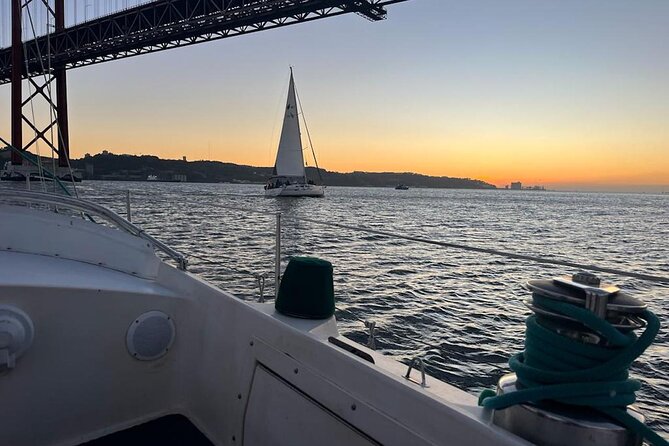 Romantic Sunset Sailing Experience in Lisbon - Cristo Rei across the river