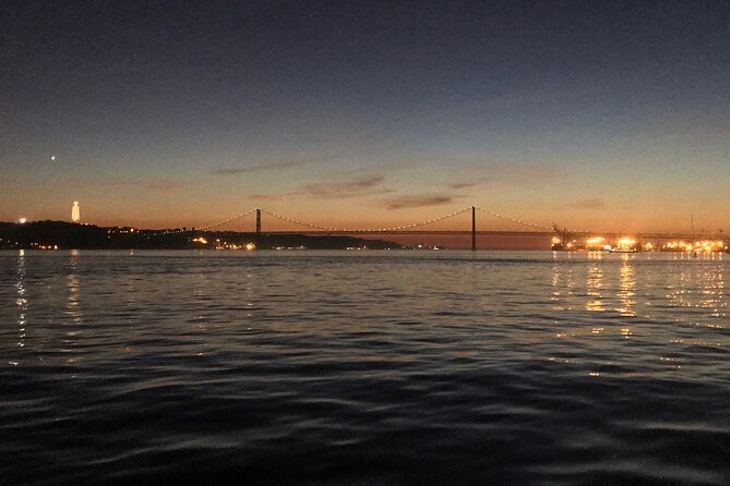 Romantic Sunset Sailing Experience in Lisbon - Sailing beneath the 25 de Abril Bridge