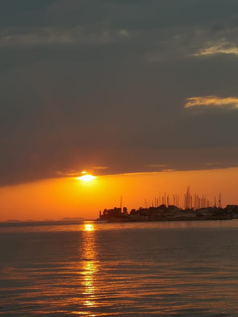 Romantic Sunset tour around Zadar with Drinks - Drinks, music, and the onboard mood