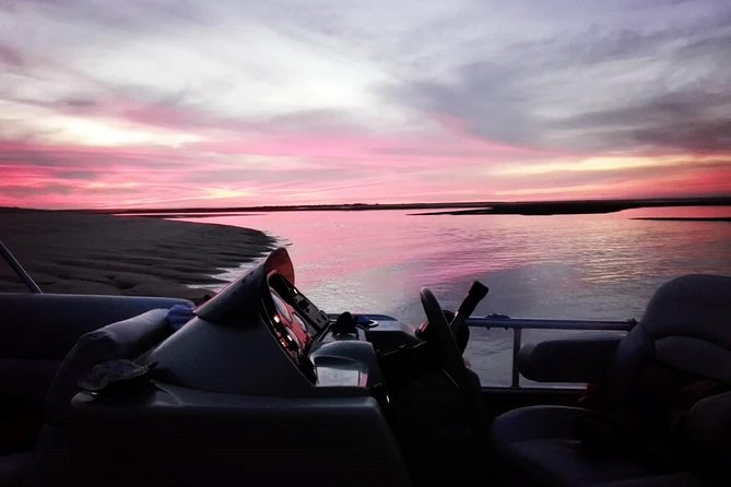 Romantic Sunset Tour in the Ria Formosa from Faro - A small catamaran in the Ria Formosa