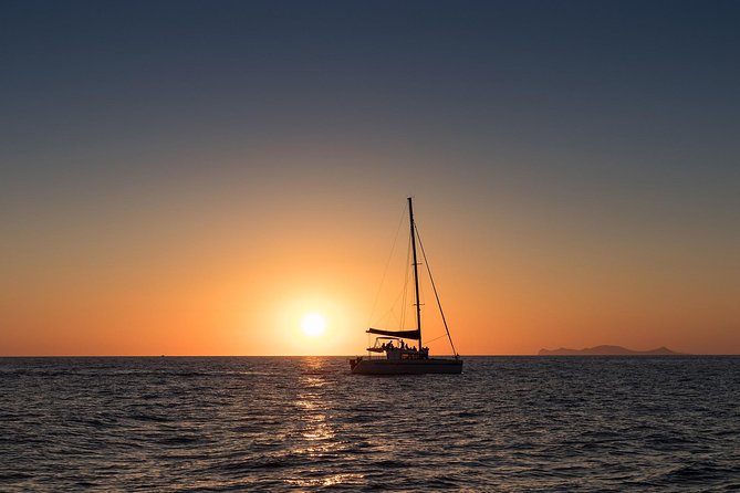 Shared Catamaran Romantic Sunset Cruise from Santorini via Volcano - Red Beach and Santorini’s most unusual colors