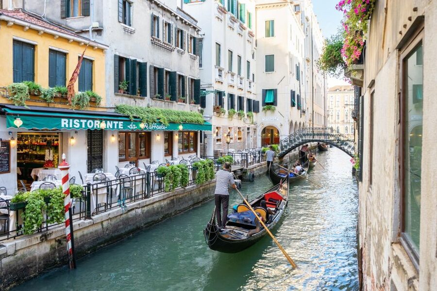 Venice: Romantic Gondola tour and Dinner for two - Meeting the gondolier beside the Gritti Palace