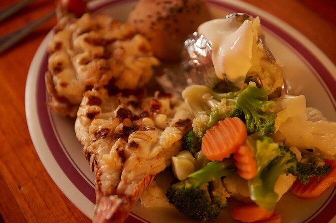 Your Romantic Dinner in Cancun, includes national open bar and live music - Dinner choices: lobster, steak, and surf and turf